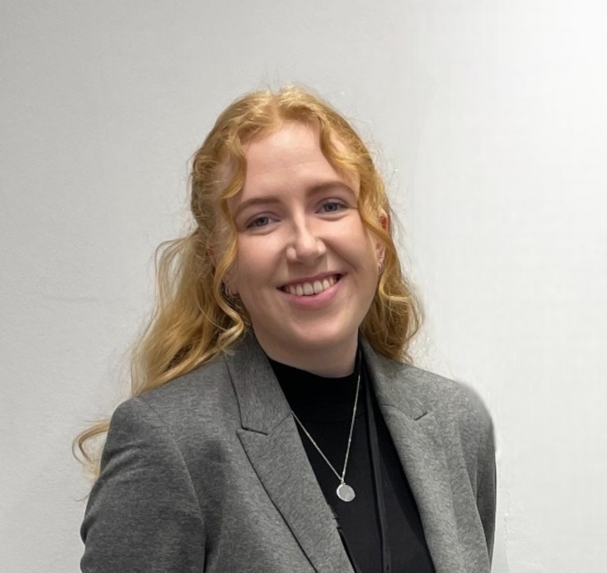 A woman smiling for the camera