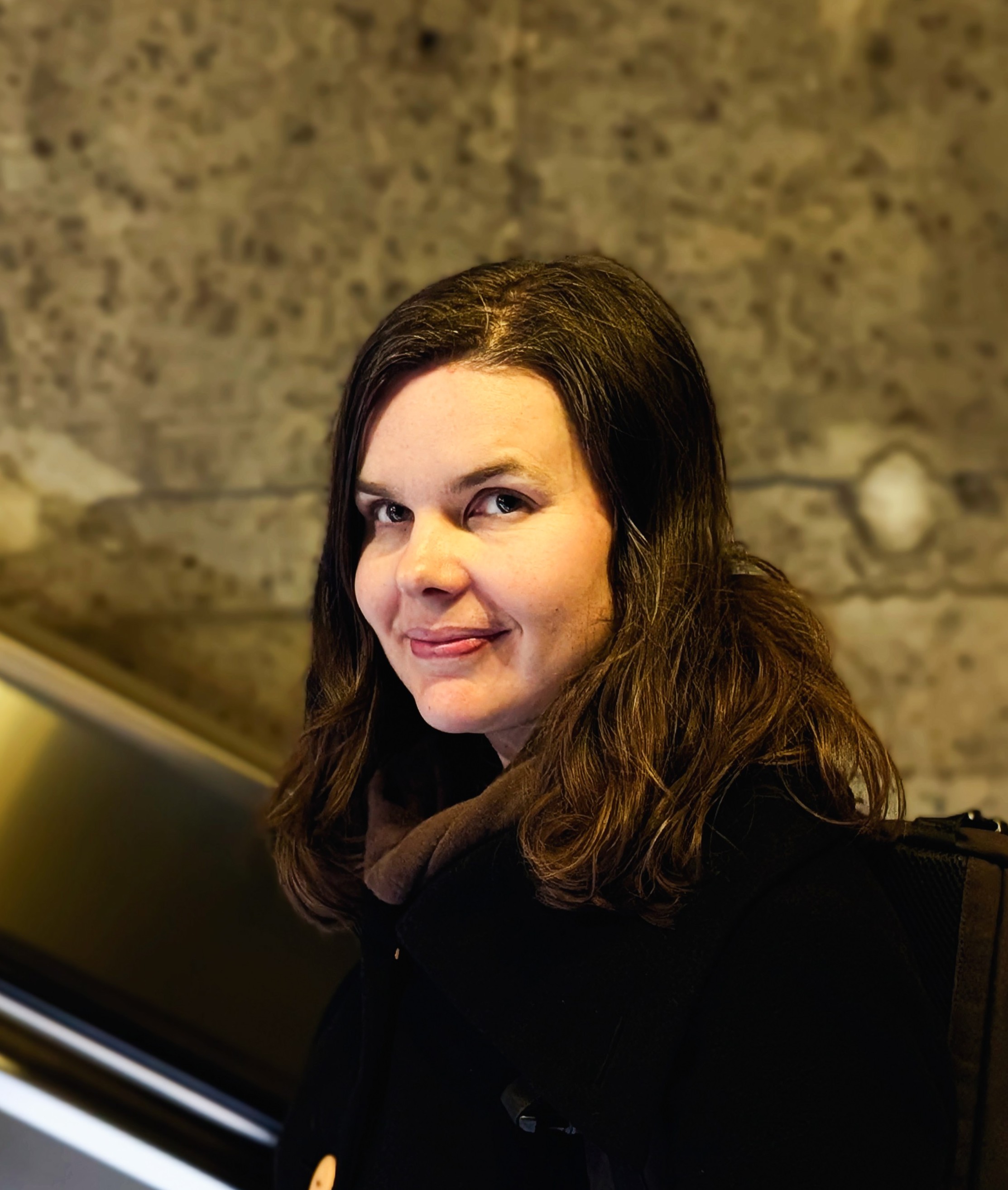 A woman smiling for the camera