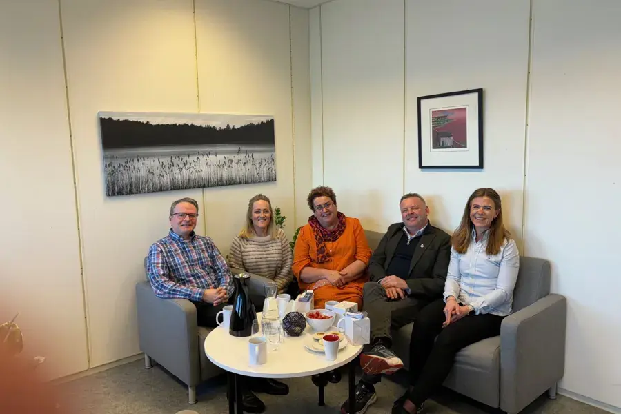A group of people sitting on a couch
