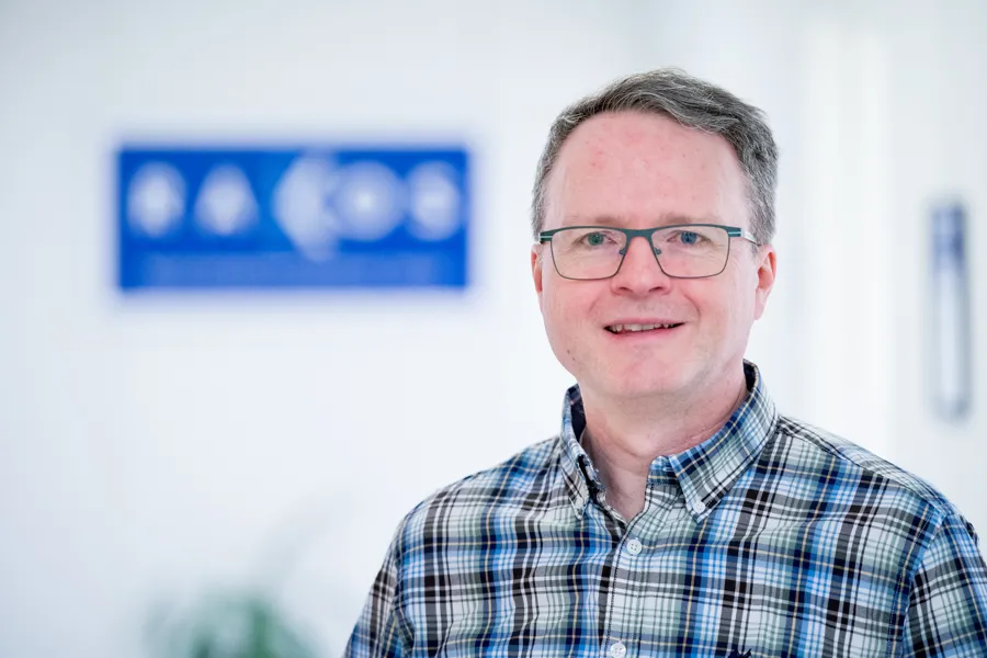 A man wearing glasses