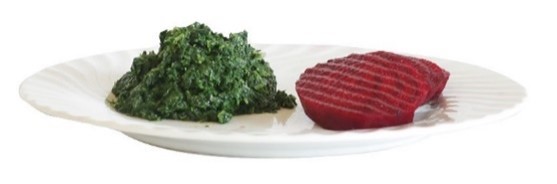 A piece of meat and a piece of broccoli on a plate