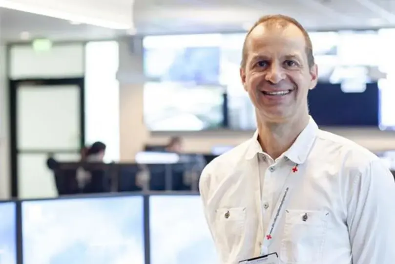 A man wearing a white shirt