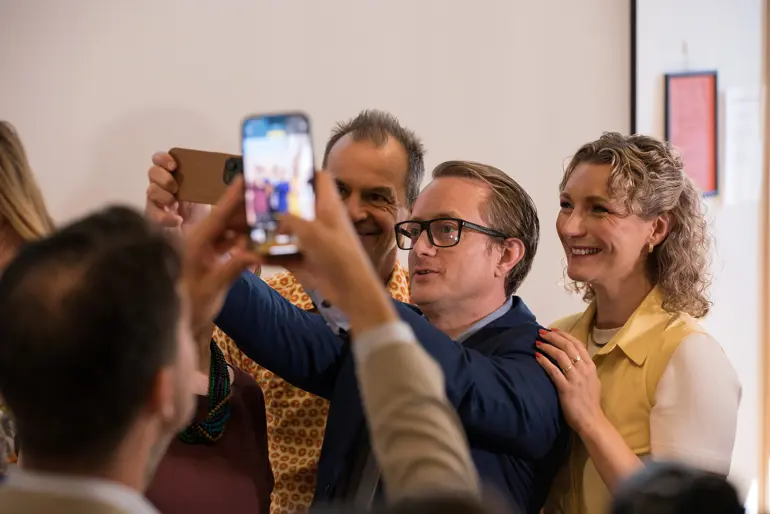 A group of people taking a picture