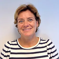 A woman smiling for the camera