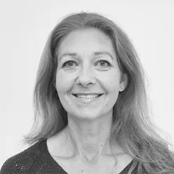 A woman smiling for the camera