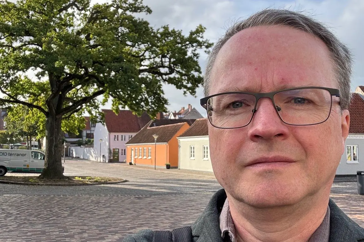 A man wearing glasses