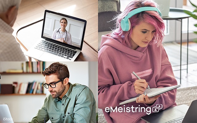 A man and a woman looking at a laptop