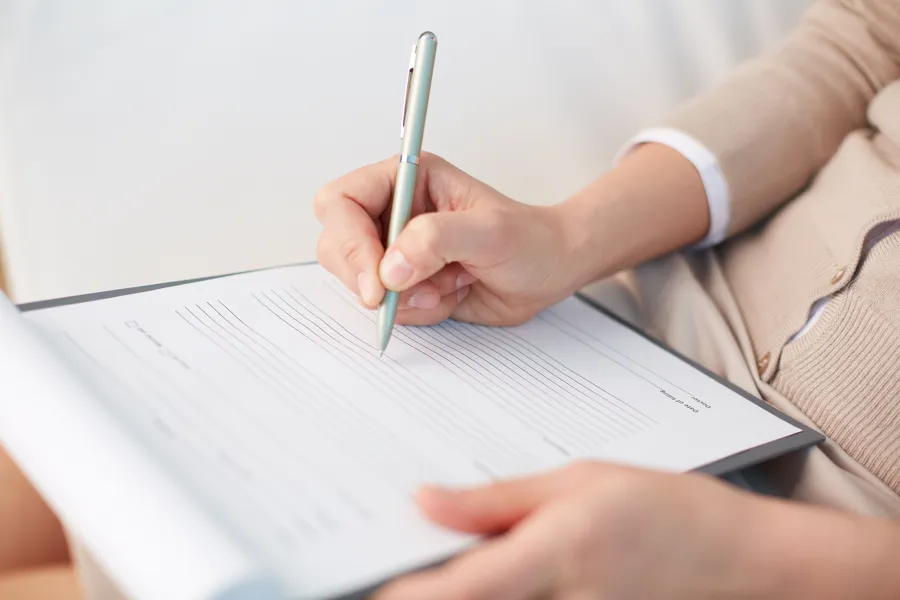 Person som tar notater