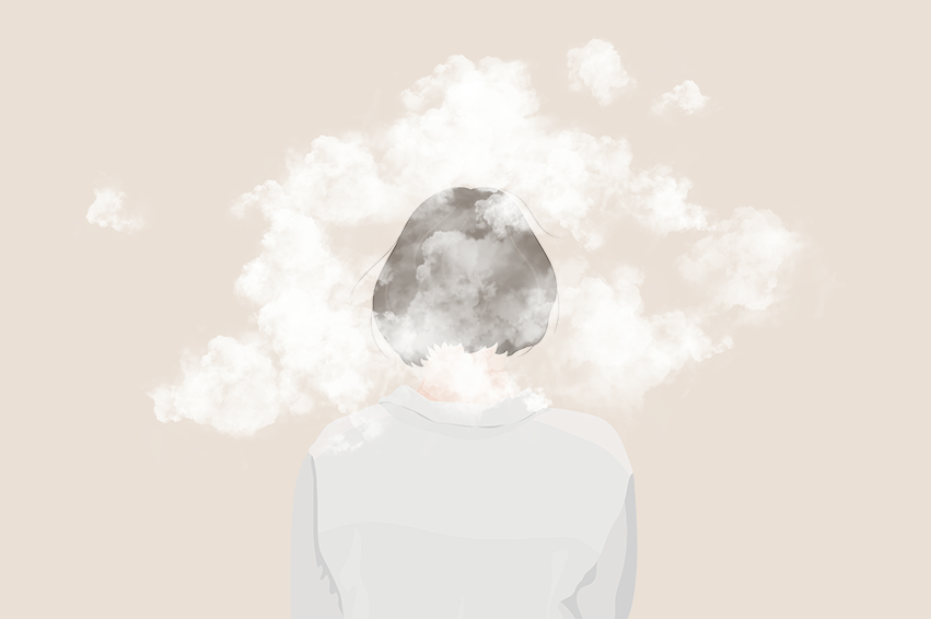 En person med røyk som kommer ut av munnen