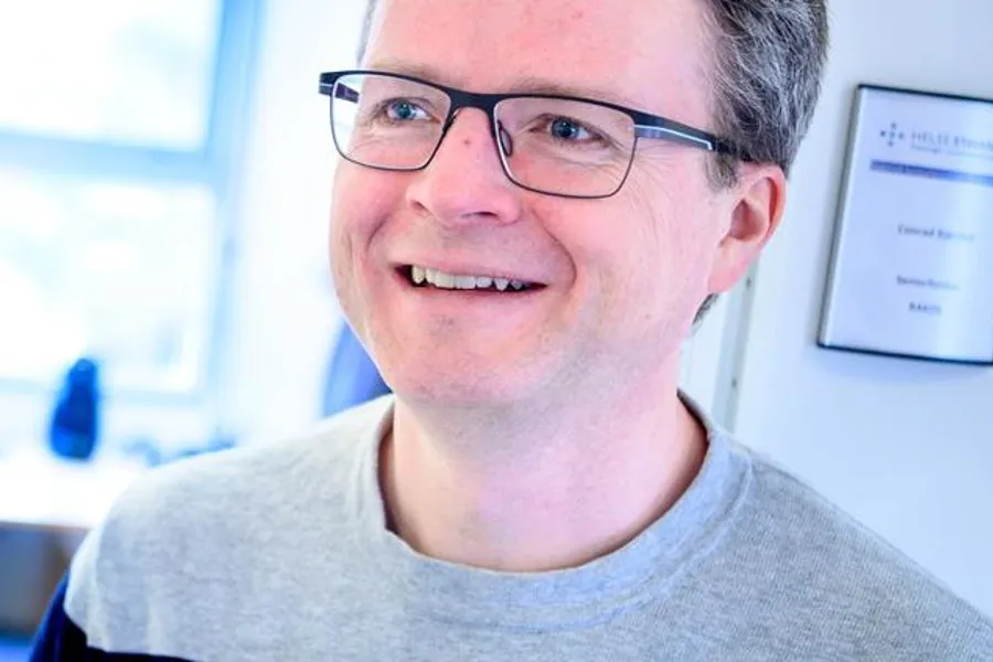 A man wearing glasses