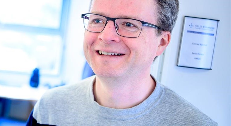 A man wearing glasses